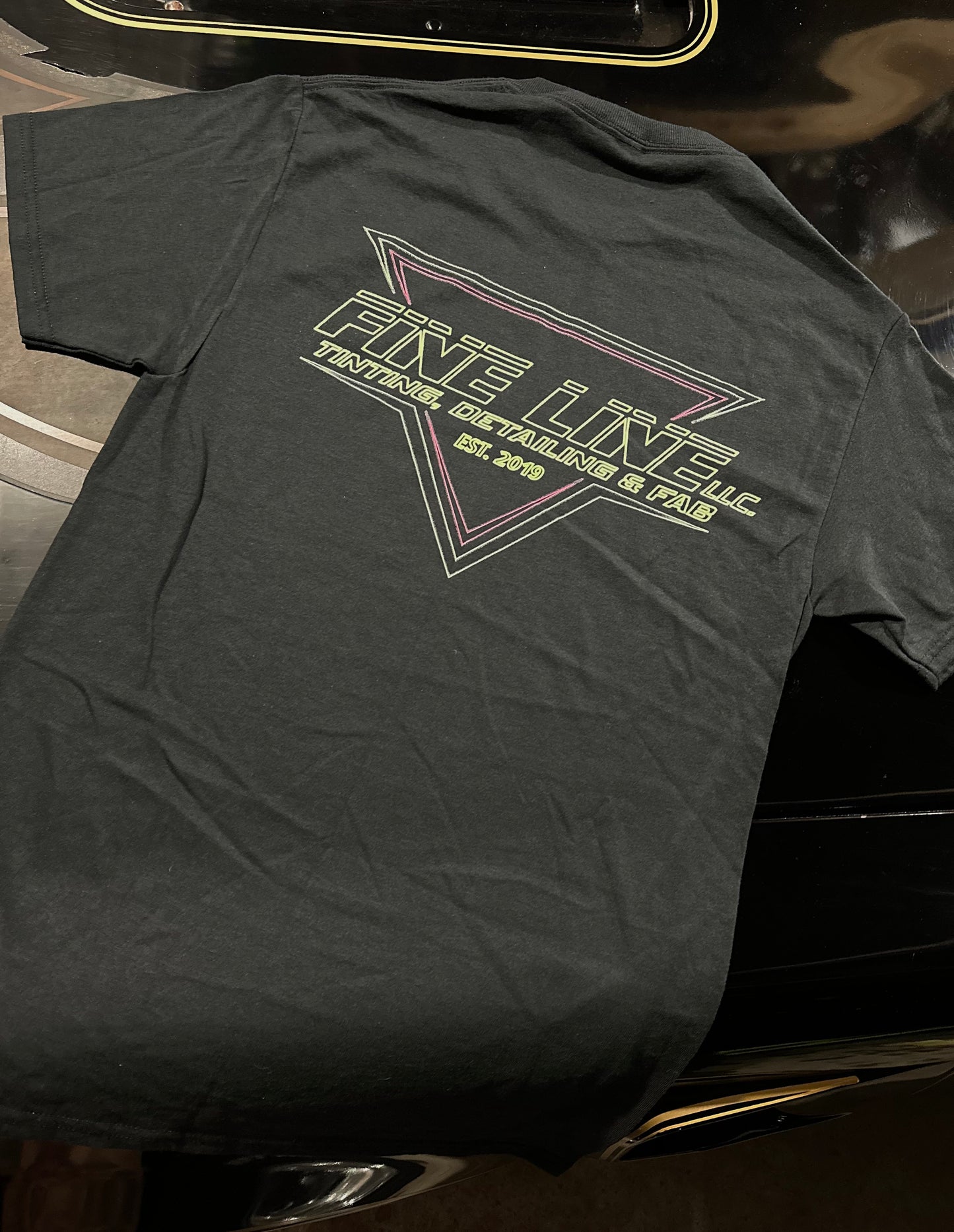 Black FL T-Shirt with Green and Pink Logo