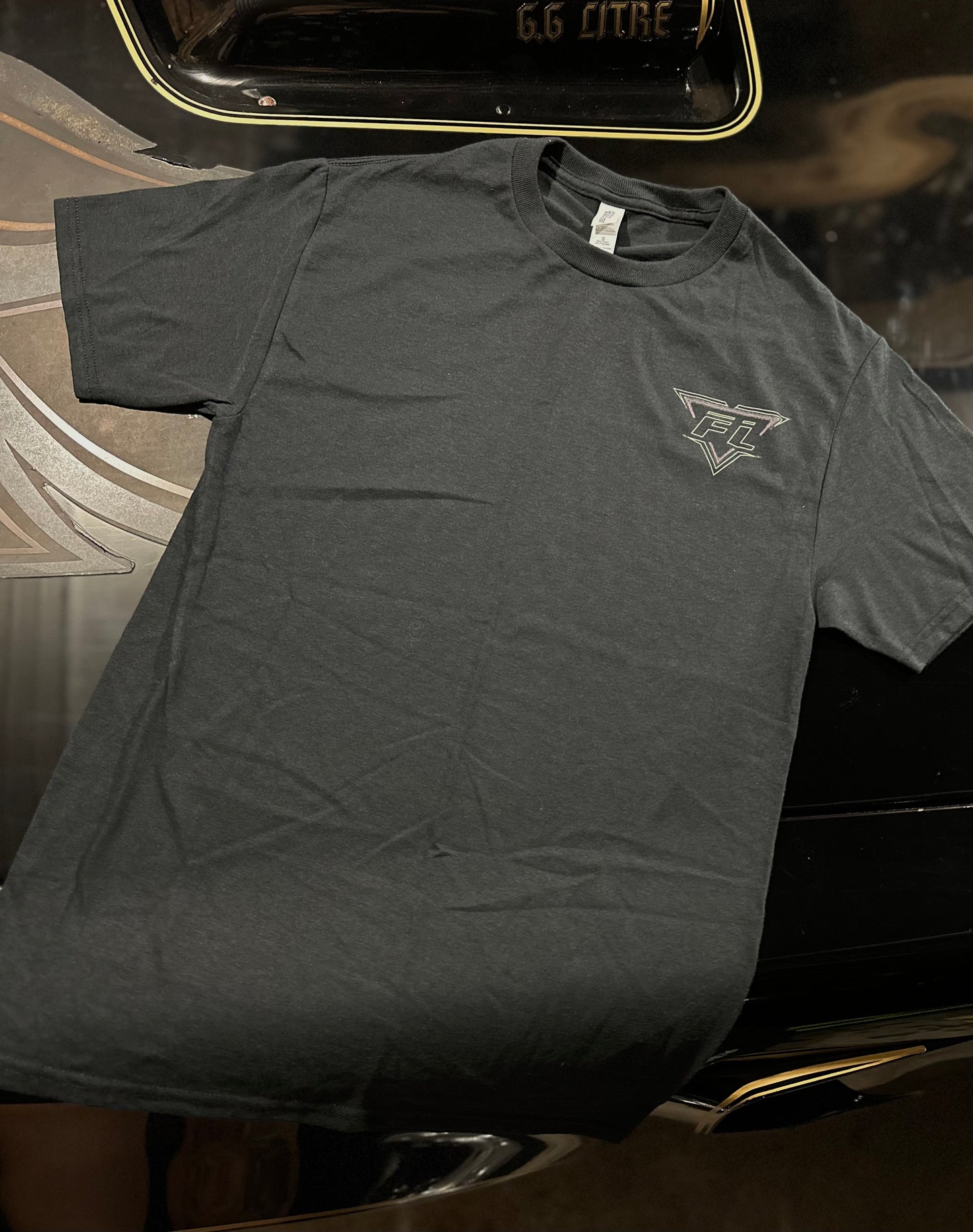 Black FL T-Shirt with Green and Pink Logo